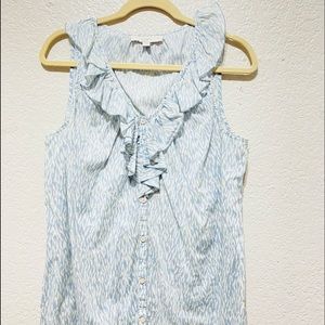 sleeveless pale blue and white cotton blouse